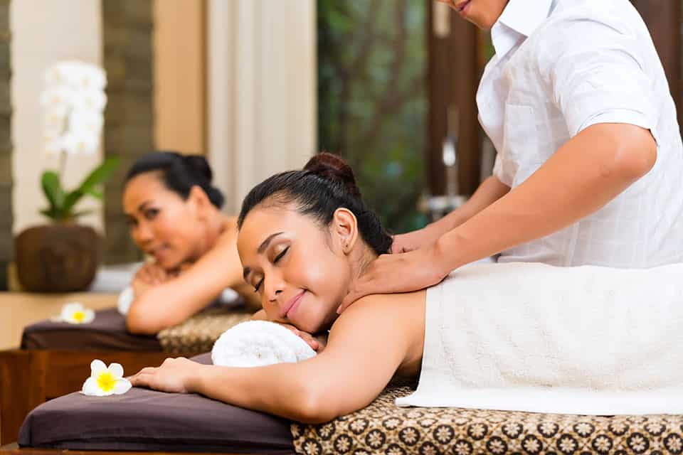 woan enjoying massage at Blu Rain Massage